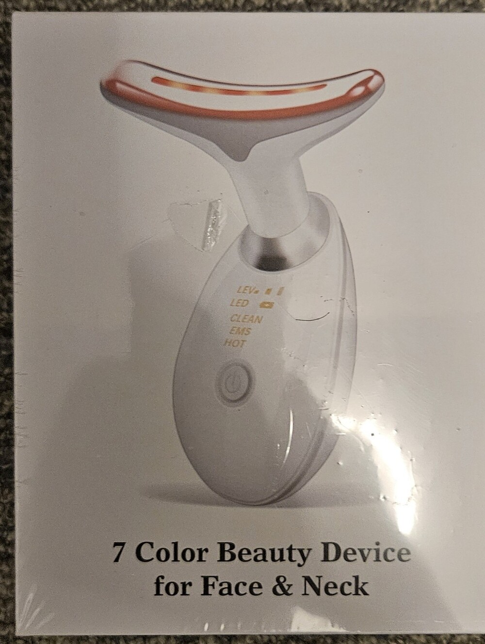 7 Color Beauty Device for Face & Neck - White with Orange Accent